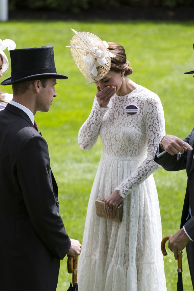  Kate, in high spirits for much of the day, hides a giggle as she chats with fellow racegoers and enjoys the sunshine