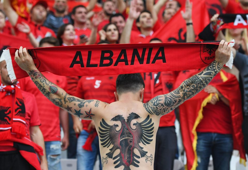  An Albania fan shows off his body art before the team played hosts France in Marseilles