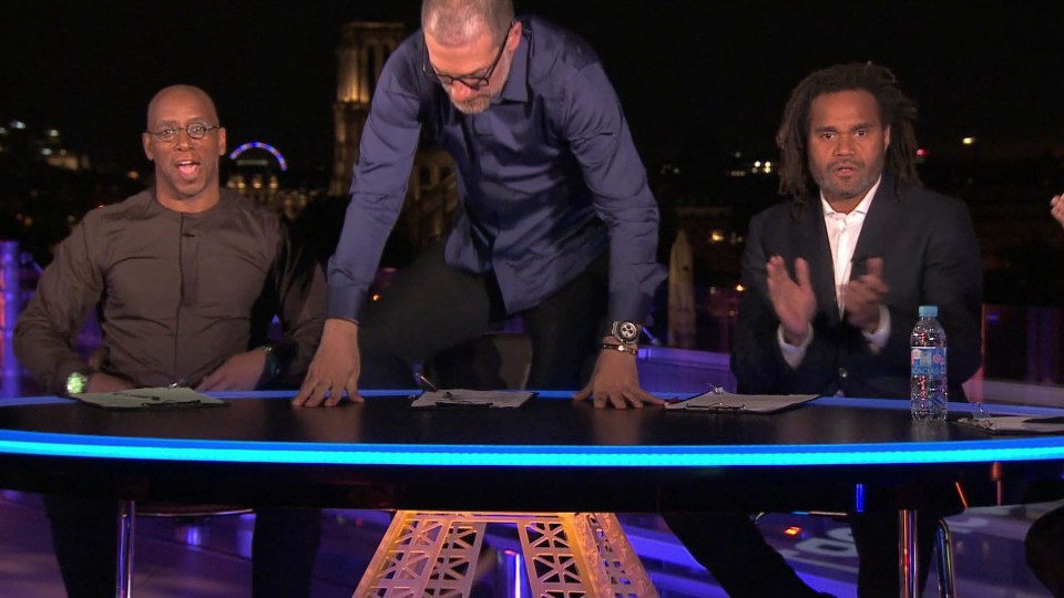  Bilic begins his climb onto the unsteady looking ITV pundit table