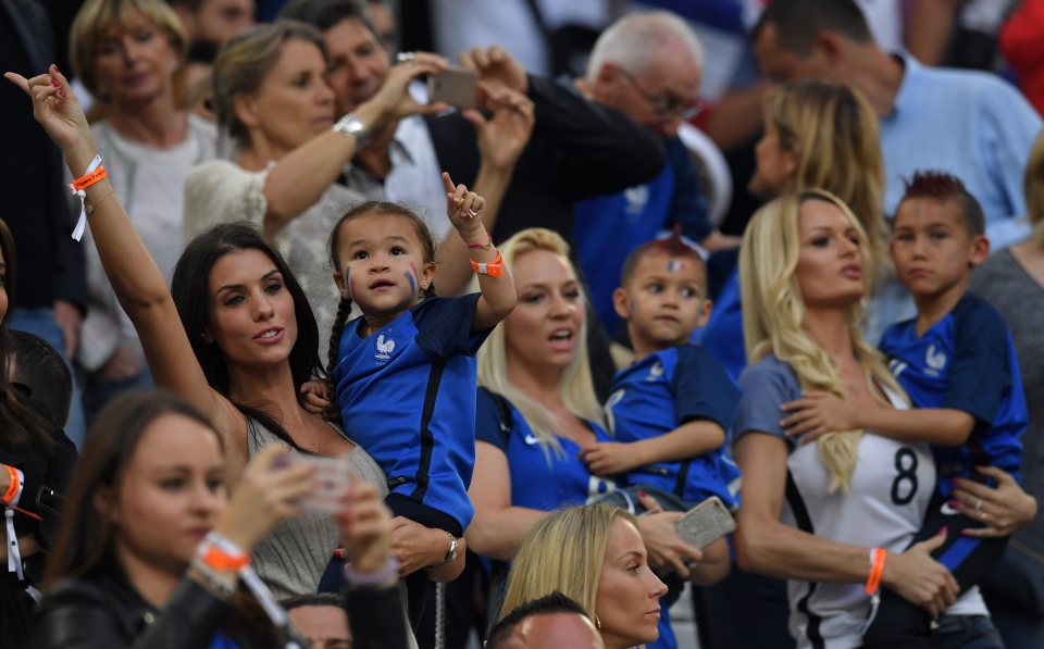  Ludivine Sagna (L) and Ludivine Payet (second from R) are just two of Euro 2016‘s gorgeous Wags to turn out. The partners of the France stars cheer from the crowd