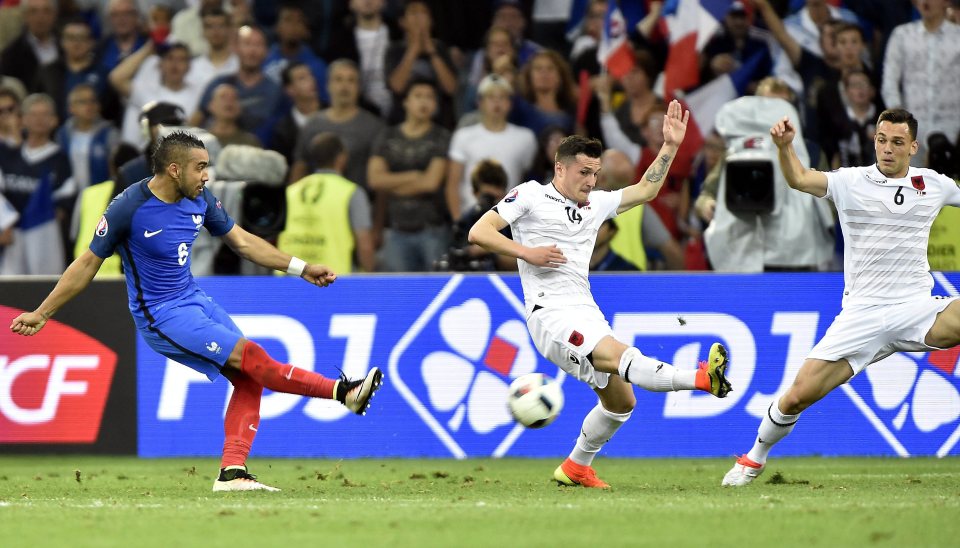  Dimitri Payet takes on Albania defence before curling in for France‘s second goal