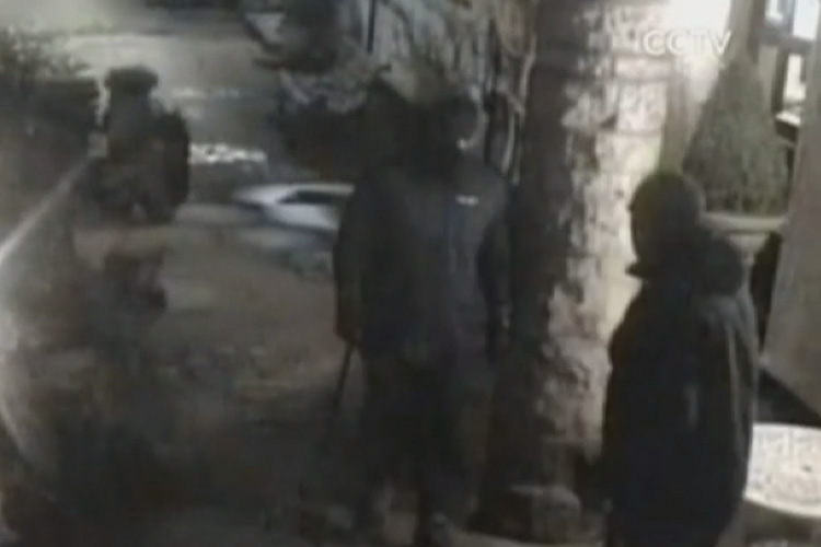  The footage shows the masked-pair looking round the property before the vicious attack