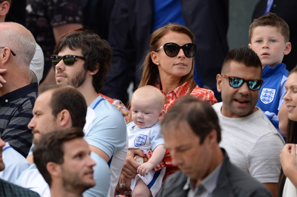  Mrs Rooney holds her new bundle of joy Kit