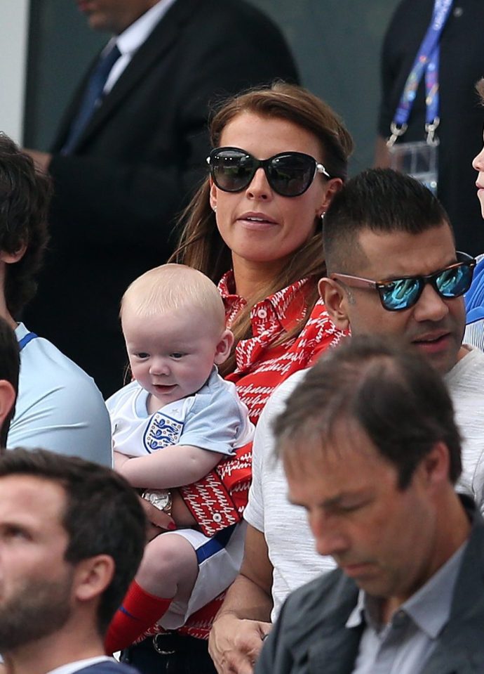  Kit cracks a smile during the match as Coleen looks towards the camera