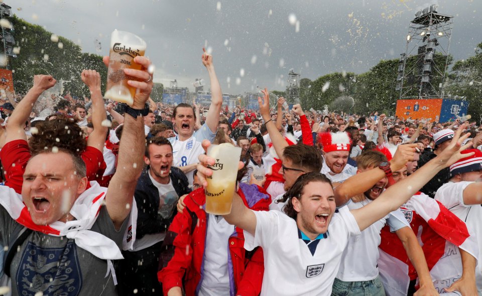 England fans react after their team scores goal as they watch the England v Wales EURO 2016 Group B soccer match in Paris