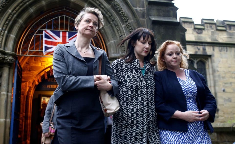  Yvette Cooper (left) leaves St Peter's Church in Birstall...after vigil