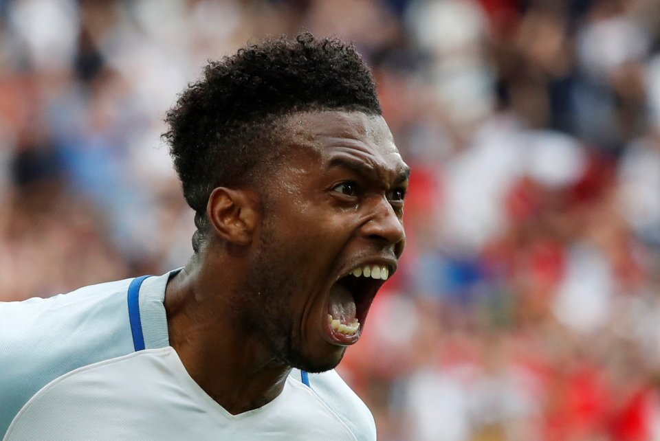  Striker Daniel Sturridge celebrates his emphatic winner against the Dragons