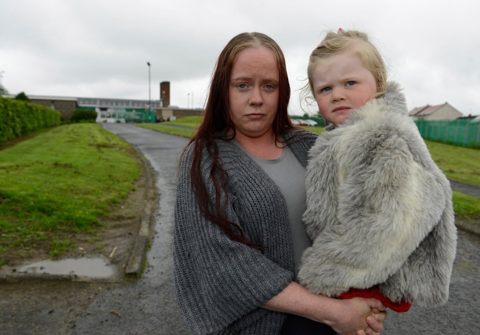 Mum Lynsey holding her three-year-old daughter Charlie, who picked up and needle and pricked herself