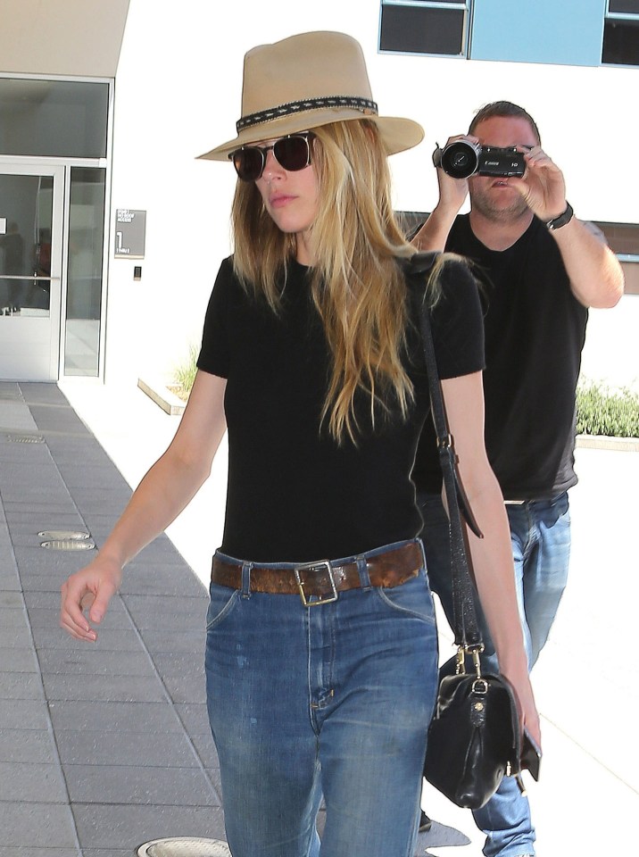 Feeling the strain... Amber Heard out and about in California