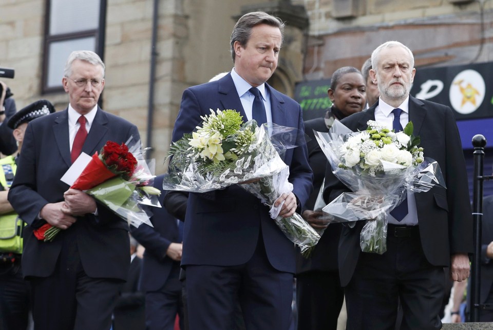 Prime Minister David Cameron and Labour Party leader Jeremy Corbyn pictured in Birstall, West Yorkshire, to pay their respects to their colleague Mrs Cox