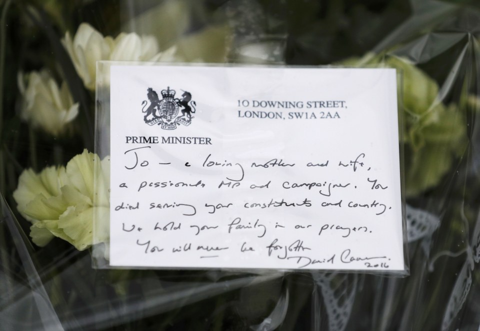  Prime Minister David Cameron's hand written note is seen on the tribute he left near the scene of the murder of Labour MP Jo Cox in Birstal