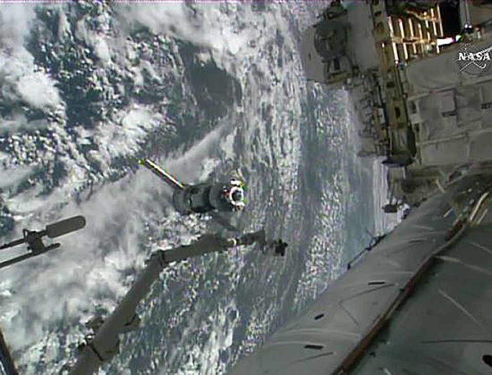  Still images from NASA television capture the moment the Soyuz capsule detached