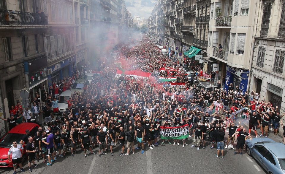 Thousands of Hungarian fans march towards the Velodrome Stadium in Marseille