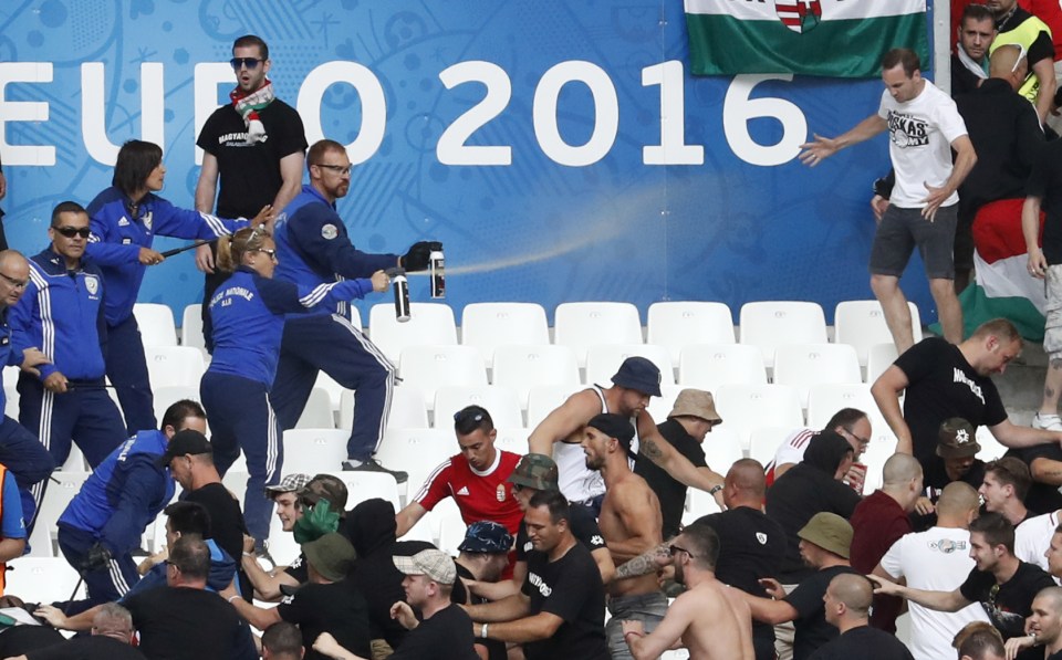 Tear gas is sprayed by stewards at the stadium