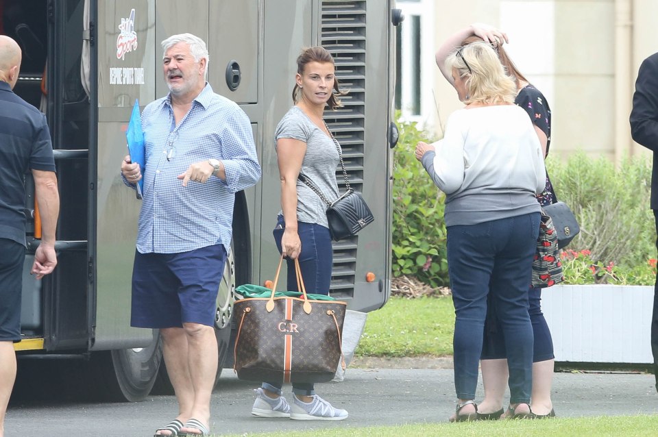 Coleen carried a number of bags as she checked the family had all their luggage before boarding 