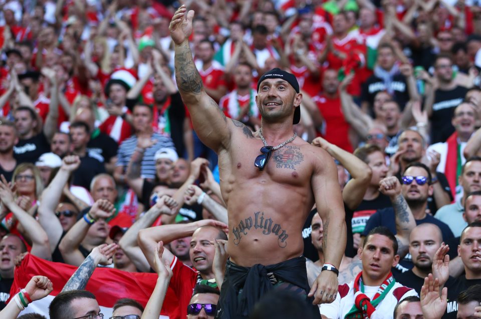  A Hungary fan stripped off to reveal his tatts during the Group F match against Iceland