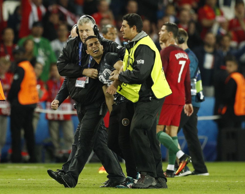  The fan exits the stage after meeting superstar Cristiano Ronaldo