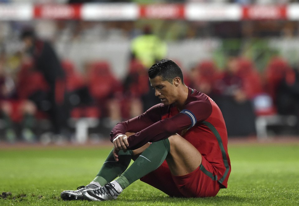  Cristiano Ronaldo reacts after his penalty miss against Austria