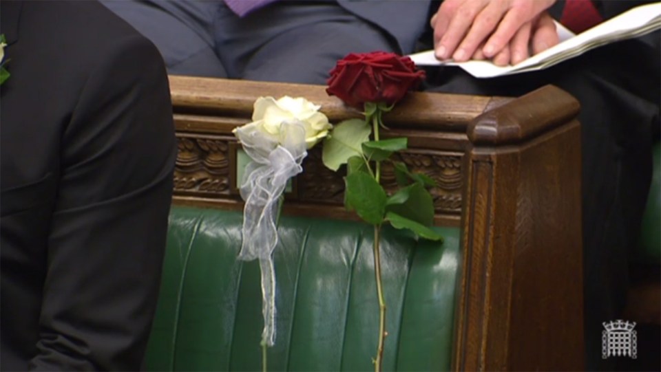 A white and red rose were placed where Jo Cox would have sat in the Commons