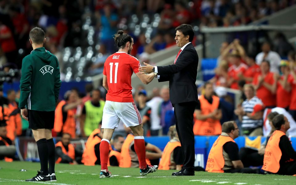 Coleman congratulates Bale as he took a well-earned rest with the game already won