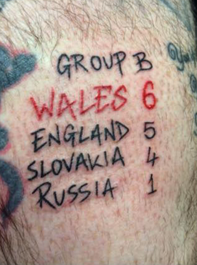  One delighted Welshman had the Group B table inked on his leg