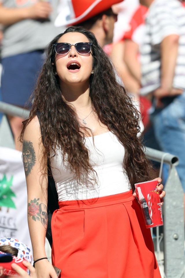  A tattooed Polish fan enjoys the sunshine before the game against Ukraine in Marseilles