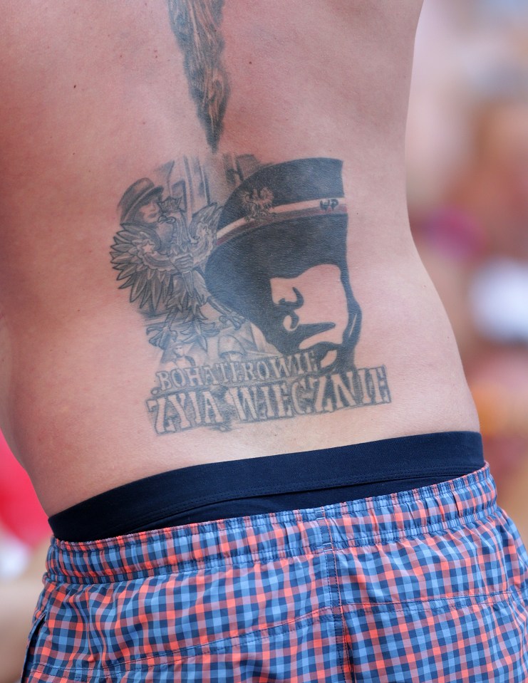  Another Polish fan had a military design on his back as the team played Ukraine