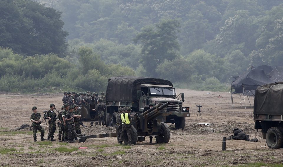  South Korean soldiers participate in formal exercises at a drill field near the demilitarized zone in Paju, Gyeonggi Province, South Korea today