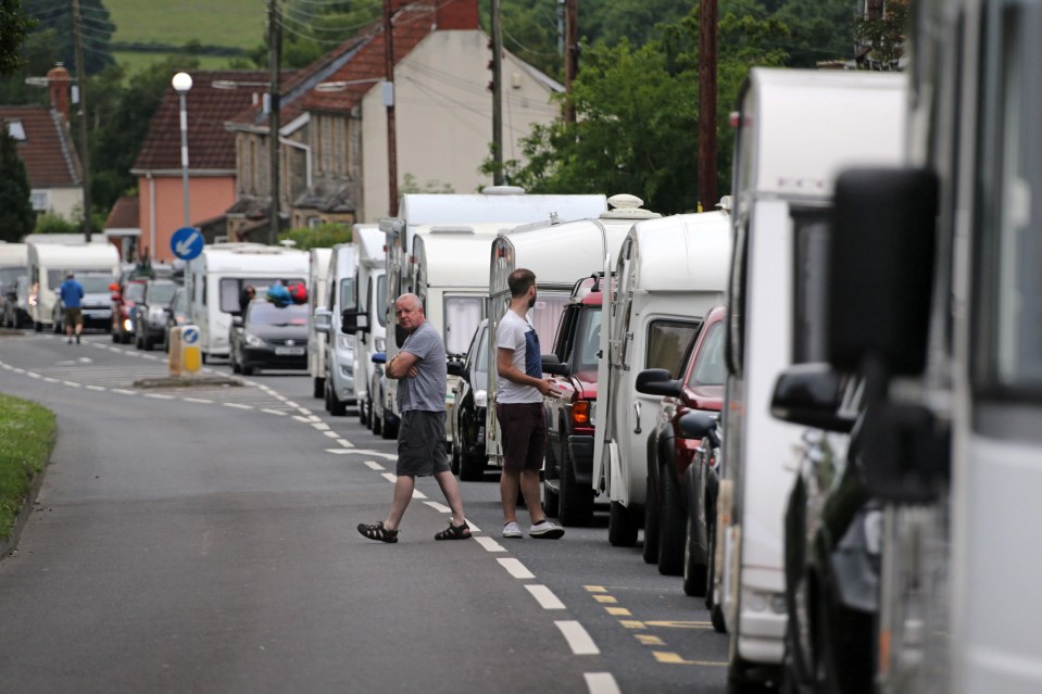  Frustrated fans stuck in hours of traffic outside Glastonbury this morning as festival organisers ban cars from the world famous event in Somerset