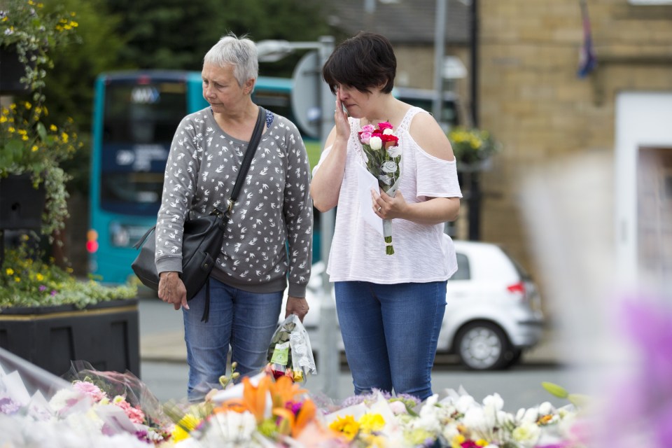  Mourners come to pay their respects on what would have been Jo Cox's 42nd birthday