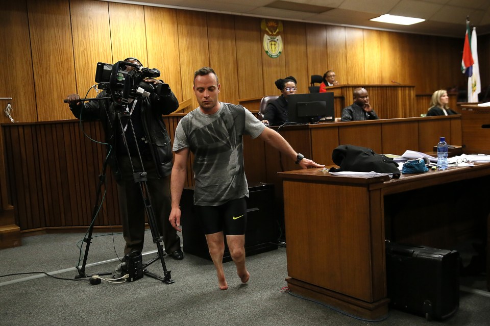 Paralympic athlete Oscar Pistorius walks in the courtroom without his prosthetic legs during his resentencing hearing for the 2013 murder of his girlfriend Reeva Steenkamp at the Pretoria High Court on June 15, 2016. A sobbing Oscar Pistorius walked hesitantly on his stumps around court on June 15 in a dramatic demonstration of his disability ahead of his sentencing for murdering his girlfriend Reeva Steenkamp. / AFP / POOL / Alon Skuy (Photo credit should read ALON SKUY/AFP/Getty Images)