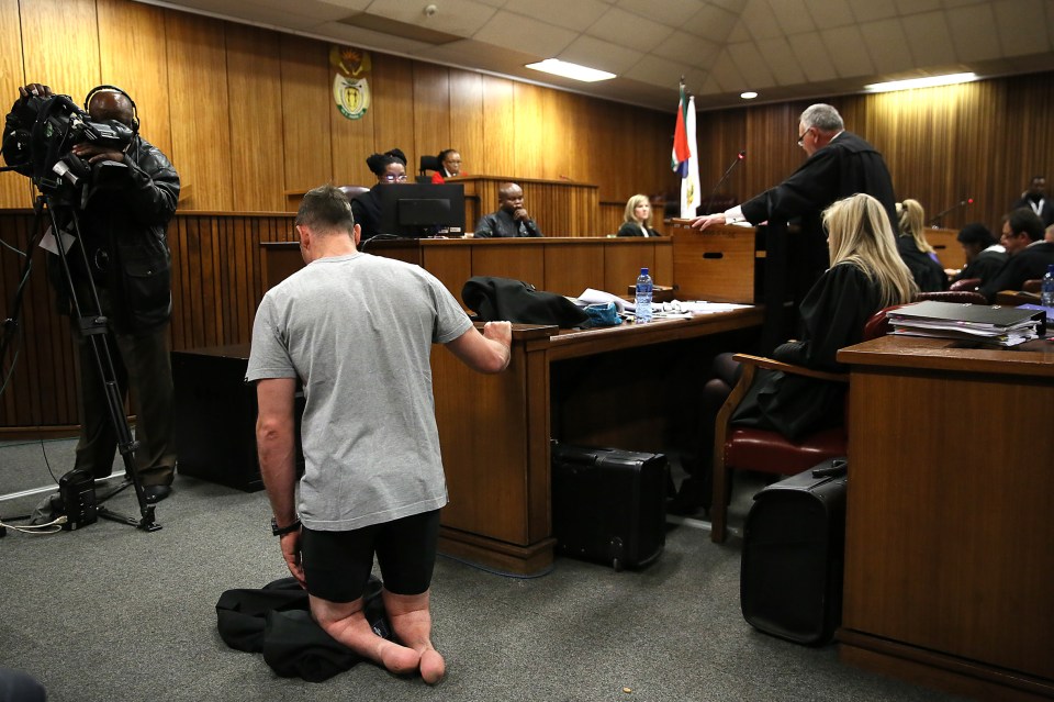 Paralympic athlete Oscar Pistorius kneels in the courtroom without his prosthetic legs during his resentencing hearing for the 2013 murder of his girlfriend Reeva Steenkamp at the Pretoria High Court on June 15, 2016. A sobbing Oscar Pistorius walked hesitantly on his stumps around court on June 15 in a dramatic demonstration of his disability ahead of his sentencing for murdering his girlfriend Reeva Steenkamp. / AFP / POOL / Alon Skuy (Photo credit should read ALON SKUY/AFP/Getty Images)