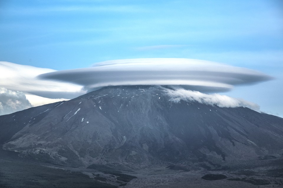  Mount Etna appears to have a "Flying saucer" on top of it