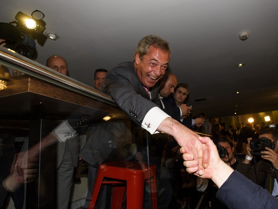  Farage is congratulated at a Brexit party in Westminster after the Leave campaign storms to victory