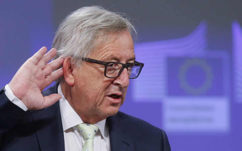 European Commission President Jean-Claude Juncker reacts on a journalist's question during a news conference on the results of Britain's EU referendum, at the EU Council building in Brussels