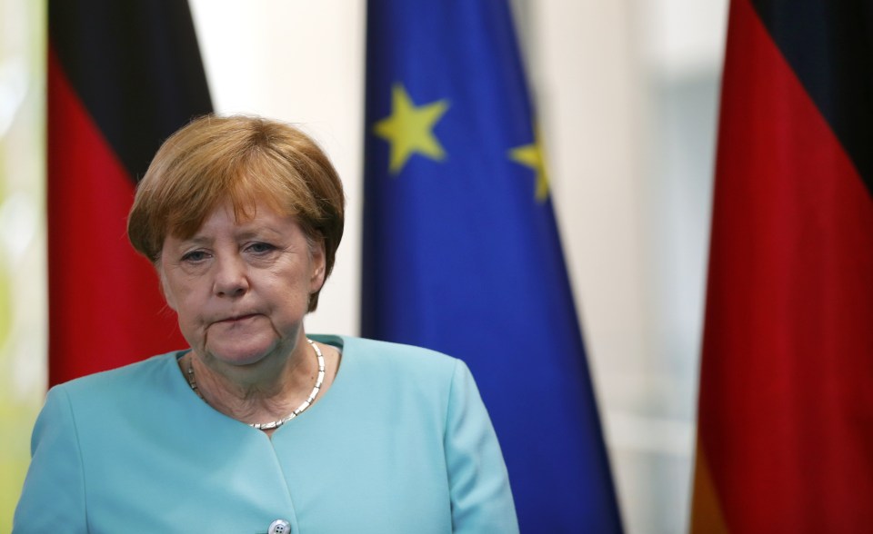 German Chancellor Merkel arrives for a statement in Berlin