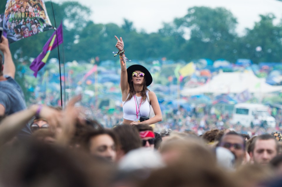  Thousands of festival-goers refused to let rain and mud dampen their party spirit