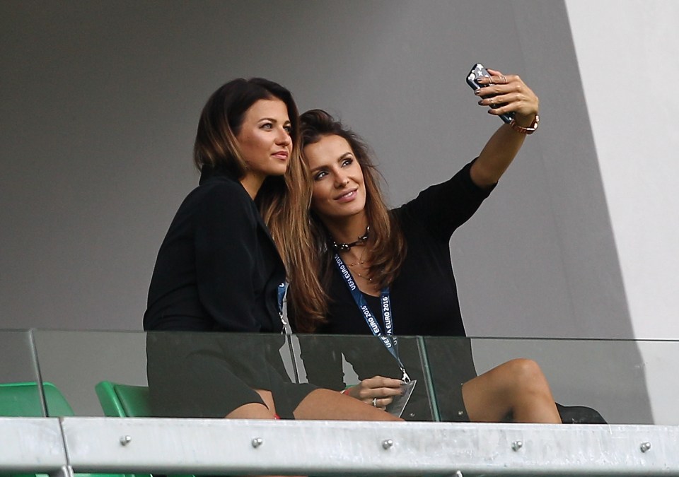 Wife of Robert Lewandowski of Poland Anna Lewandowska and wife of Poland goalkeeper Wojciech Szczesny Marina Luczenko-Szczesna take a selfie 