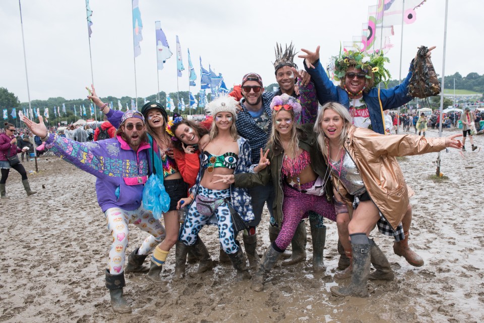  Fans have been enjoying the music despite the sodden conditions