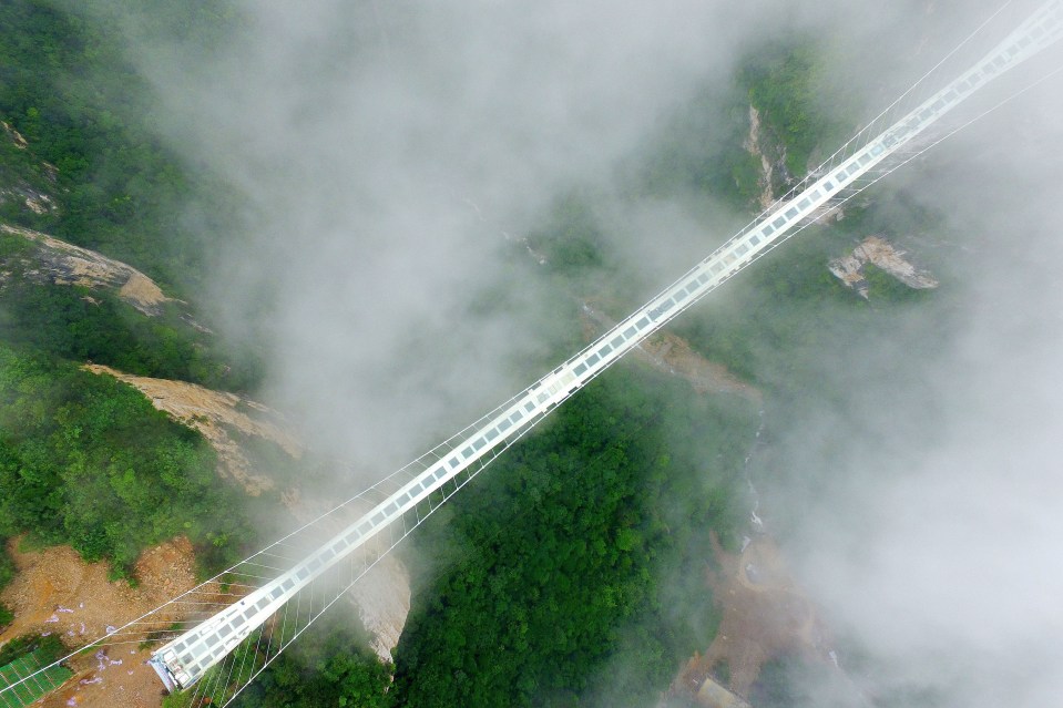 A glass-bottomed suspension bridge in Zhangjiajie in China