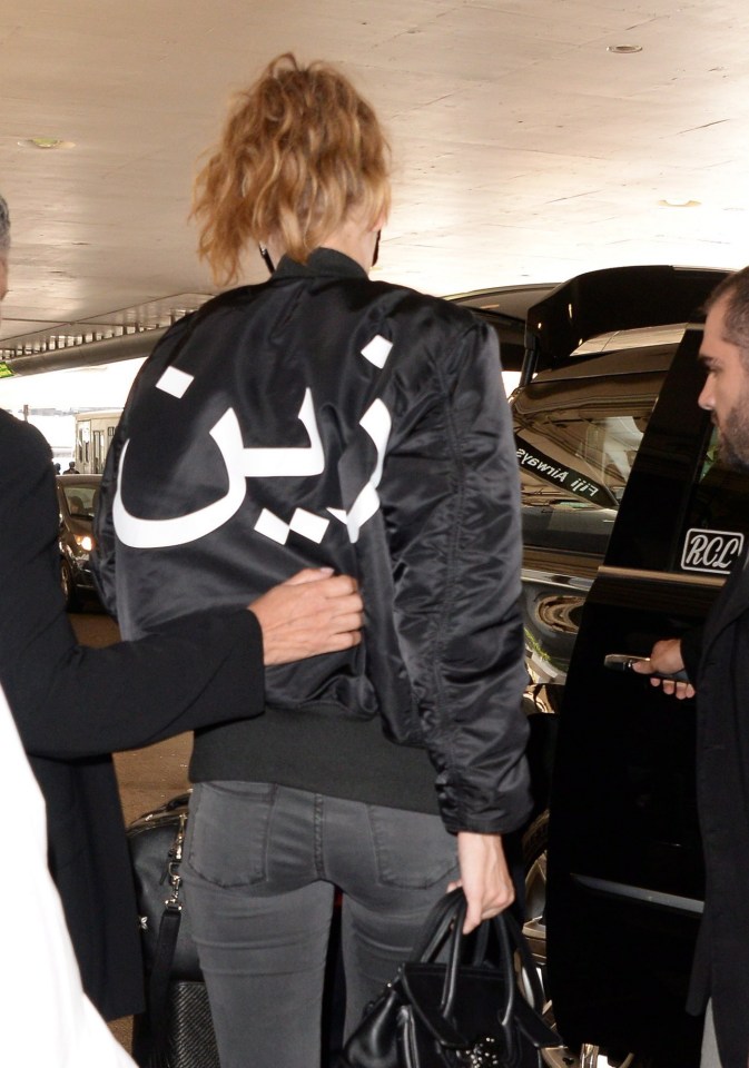  Gigi proves that she and Zayn are well and truly back together by wearing his name in Arabic across her jacket