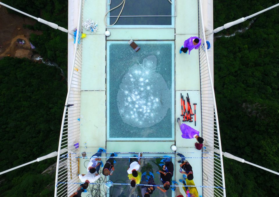 Visitors hit glass bridge with sledgehammers as part of 'safety test', Zhangjiajie city, Hunan province