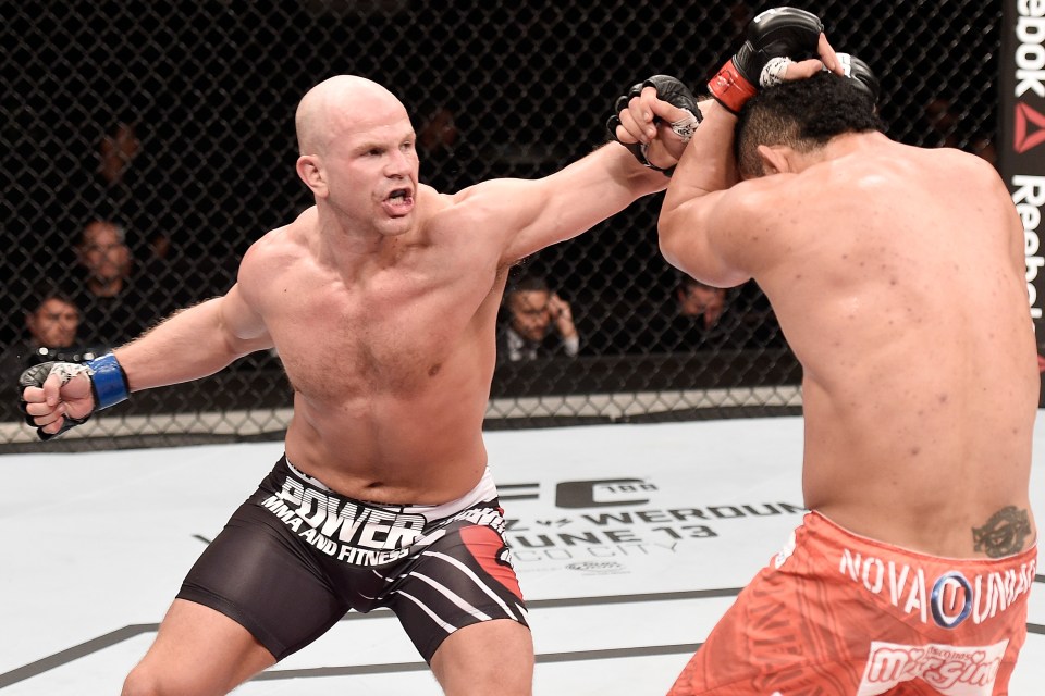  Ryan Jimmo of Canada punches Francimar Barroso of Brazil in their light heavyweight UFC bout but he was unable to defend himself when attacked by a car