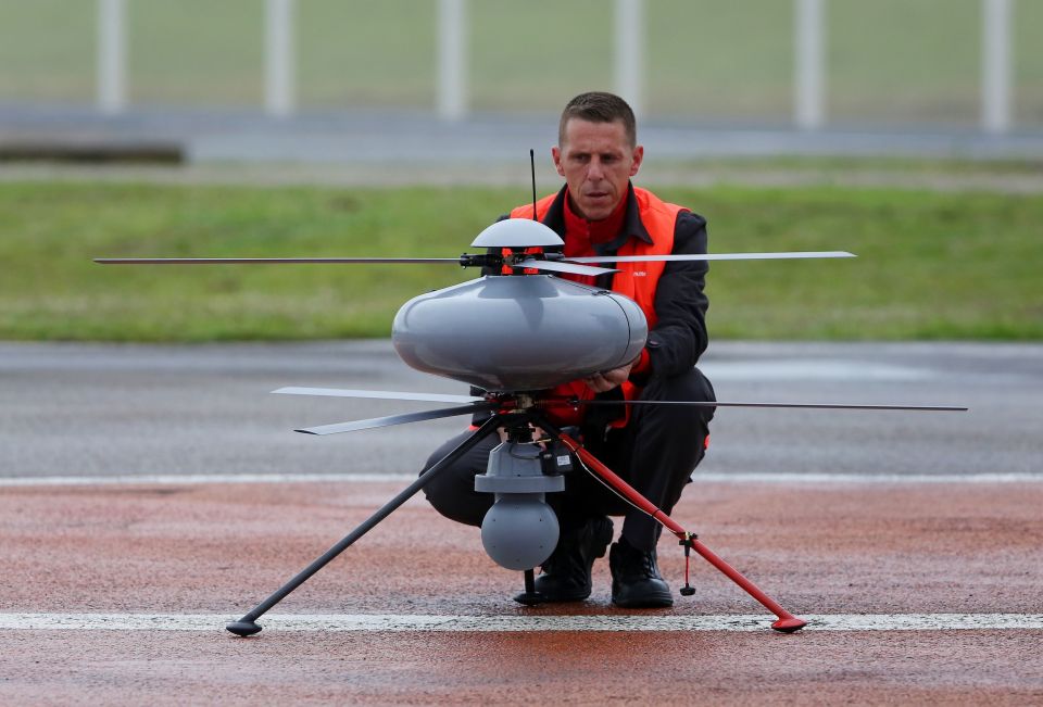  A pilot prepares a new security drone at Eurotunnel in Calais - a new tactic launched this week