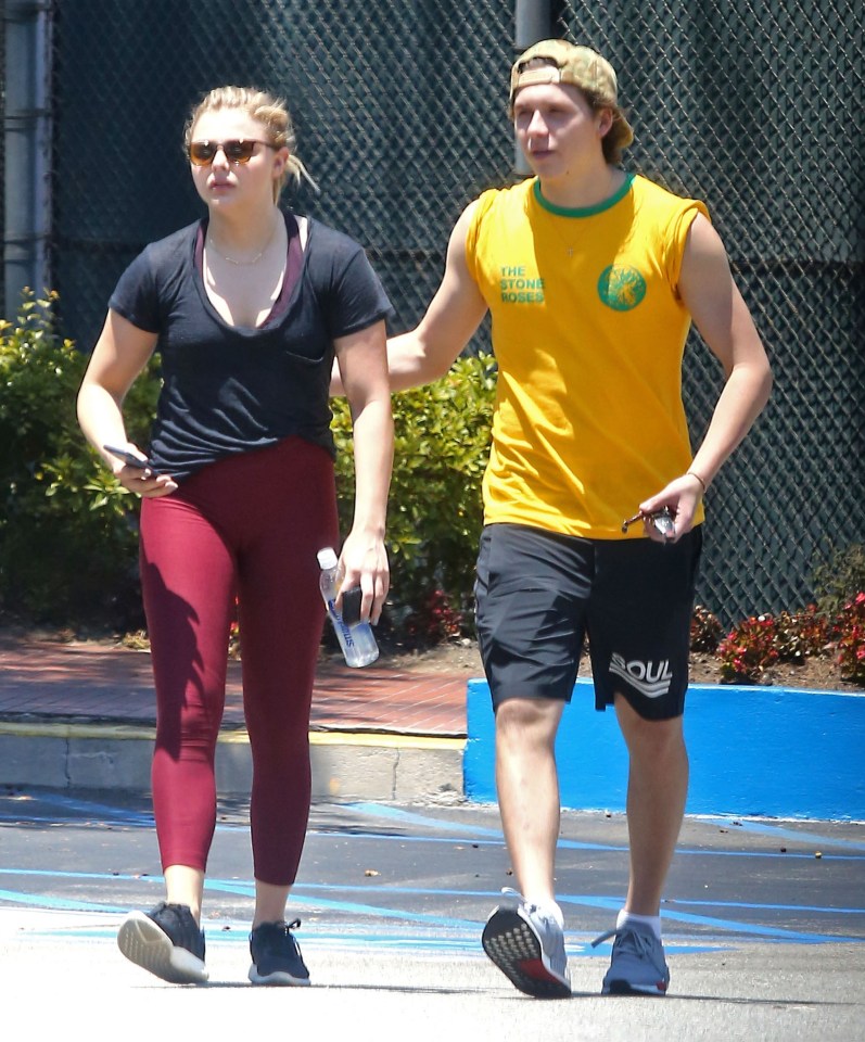  Chloe looked trendy in red workout leggings while Brooklyn opted for a yellow top