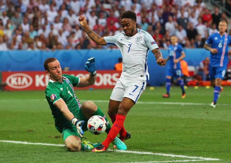 Raheem Sterling is fouled by Hannes Halldorsson to earn England a fourth minute penalty