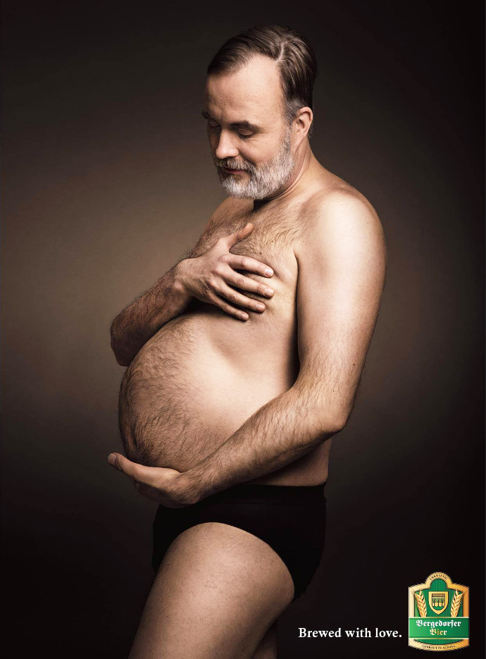  Ordinary blokes are seen cradling their beer bellies in the comical ads