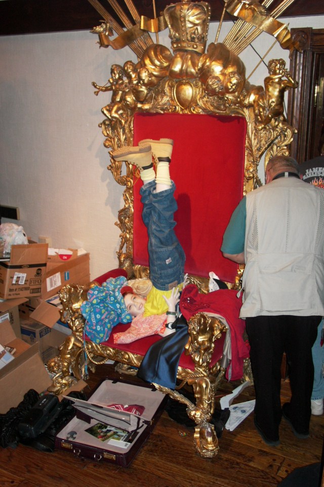  Jackson made one of his dolls do a shoulder stand on a giant red and gold throne