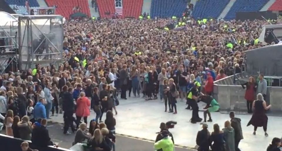  Security dragged the man off after the tussle at the half-empty arena