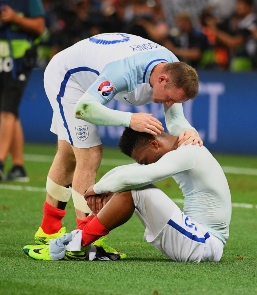 Wayne Rooney consoles Raheem Sterling after Enfland lose to Iceland